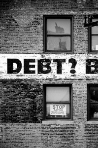 Debt question CC painted on building 199x300 Debt question CC painted on building