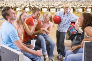 Score a FREE night of bowling for the whole family! Via Shutterstock. 