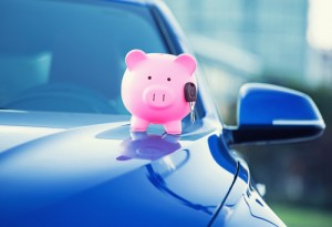 Make sure your car insurance doesn't drain your piggy bank with these money saving tips. Via Shutterstock. 