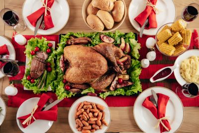 Save your money for Black Friday! Here are my 8 best tips for saving money on Thanksgiving dinner (without starving your guests!).